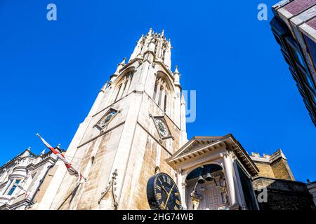 London, UK Low angle view looking up on St Dunstan-in-the-West church in center of downtown district city with old architecture on Fleet street and cl Stock Photo