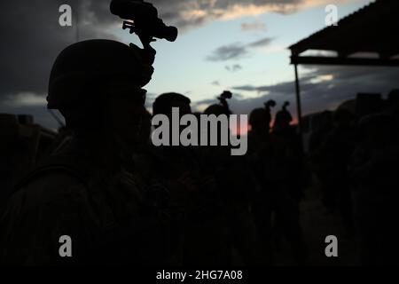 Soldiers from the 5th Special Forces Group (Airborne) and 1st Armored Division participate in pre-deployment training at Fort Bliss, TX on September 10, 2020. Members from the 1st Armored Division enabled Special Operations to enhance their understanding of training a partner force while imparting knowledge of the operational environment to their students, Stock Photo