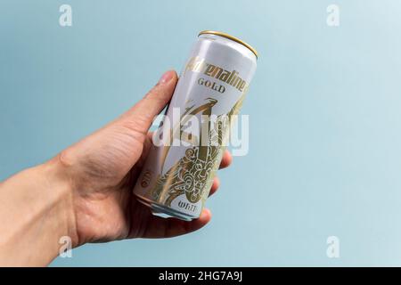 Tyumen, Russia-December 27, 2021: Adrenaline Rush Energy drink, metal can gold. Selective focus Stock Photo