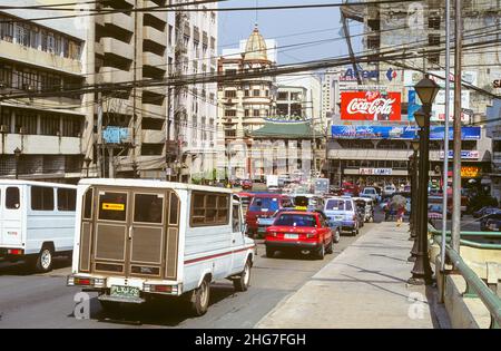 Traffic on Quintin Paredes Road on the Jones Bridge over the Pasig River in Manila, the Philippines. The bridge, officially titled the William A. Jones Memorial Bridge, links Ermita to Binondo, which is Manila's bustling and crowded Chinatown district. Pictured: traffic congestion on Quintin Paredes Road on the Jones Bridge looking towards Binondo. Stock Photo