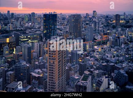 Tokyo, Japan - October 23, 2019: The skyscrapers of ARK Hills as seen from the Tokyo Tower observation deck at evening. Minato city. Tokyo. Japan Stock Photo