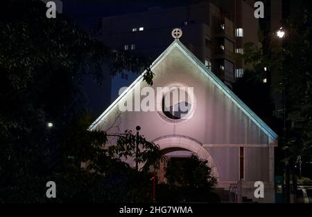 The view of the St. Andrews Cathedral church of the Tokyo Diocese of the Anglican Church at night. Tokyo Stock Photo