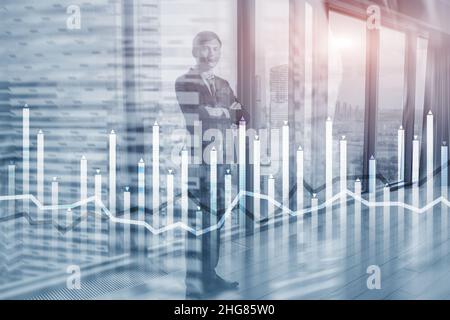 Bar graph on the background of a business center with a manager at the window. Stock Photo