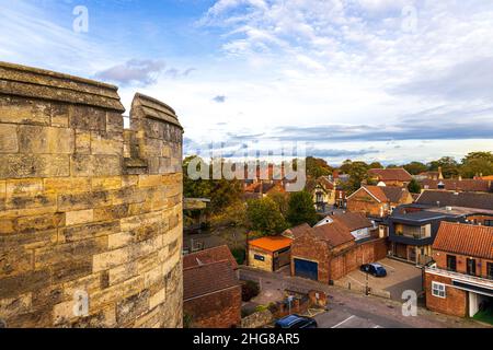 Lincolnshire is one of the most popular cities in the United Kingdom. Here a view from Lincoln Castle looking across the city just before sunset, on a Stock Photo