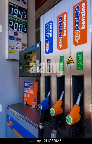 A gas pump at a gas station shows very high prices for gasoline and diesel. Stock Photo