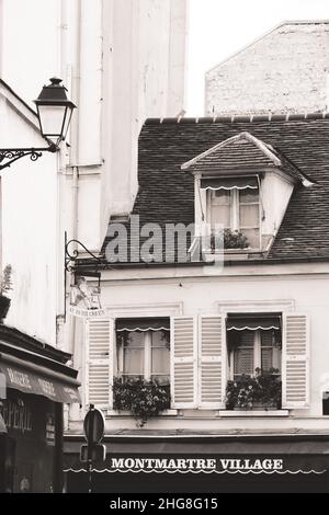 Facade of a beautiful old house in Montmartre neighborhood, Paris, France Stock Photo