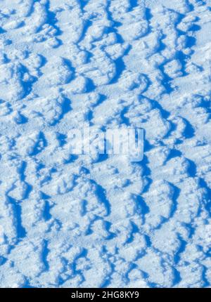 Texture of the snow, white blue pattern of the snow, cold day, natural winter pattern after snowstorm Stock Photo