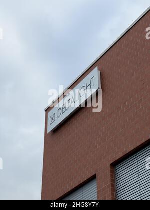 Basel, Switzerland - Dec 20, 2021: Delta Light logotype on the facade of authorised dealership supplier in Basel Stock Photo