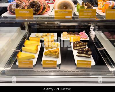 Basel, Switzerland - Dec 20, 2021: Expensive sweets inside Mcdonald's Restaurant in Basel Stock Photo