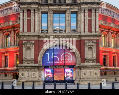 Royal Albert Hall with floodlights coming on at dusk Kensington Gore Borough of Kensington and Chelsea London England Stock Photo