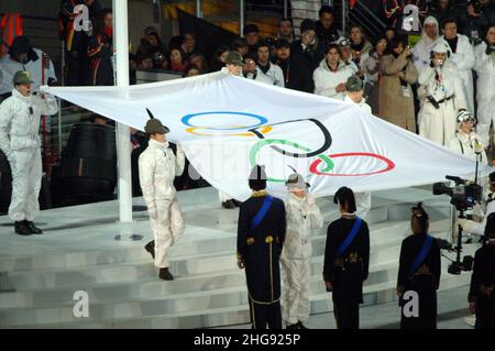 Turin Italy 26-02-2006: Turin 2006 Olympic Winter Games, closing ceremony of the Olympic Games,the Olympic flag Stock Photo