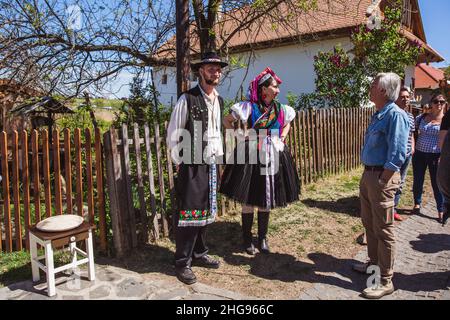 HOLLOKO, HUNGARY - April 12, 2019: Easter festival in the folklore village of Holloko in Hungary. Villagers dressed in traditional costumes. The villa Stock Photo