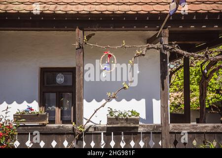 HOLLOKO, HUNGARY - April 12, 2019: Traditional houses in village Holloko in Hungary. The village is included in the UNESCO list of cultural values Stock Photo