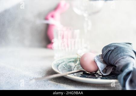 Festive Easter place setting with painted Easter eggs Stock Photo