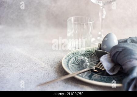 Festive Easter place setting with painted Easter eggs Stock Photo
