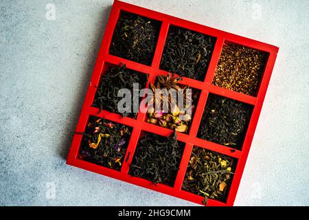 Overhead view of a box of assorted loose leaf teas on a table Stock Photo