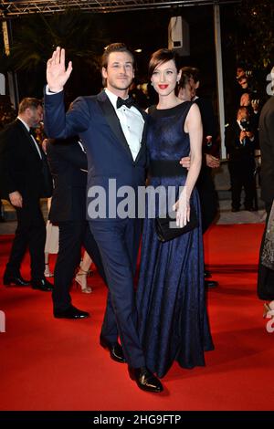 File photo dated May 17, 2014 of Gaspard Ulliel and girlfriend Gaelle Pietri at the 67th Cannes Film Festival. Actor Gaspard Ulliel is hospitalized at the Grenoble University Hospital in serious condition, after a fall on skis which occurred on Tuesday at 4 p.m. in the Savoyard resort of La Rosiere, it was reported on Wednesday January 19. The 37-year-old comedian was found unconscious on the ski area with significant head trauma. He was taken care of for 1h15 on the spot before being able to be evacuated to the hospital, according to information from France Bleu Pays de Savoie. Photo by Nicol Stock Photo