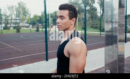 athletic mixed race man standing at outdoors gym,stock image Stock Photo