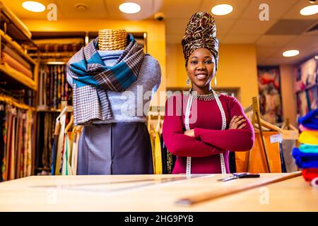 authentic ethnic africa america sellerwoman working in shop Stock Photo