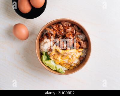 Chicken Don with rice, egg served in japanese style food set top view on grey background Stock Photo