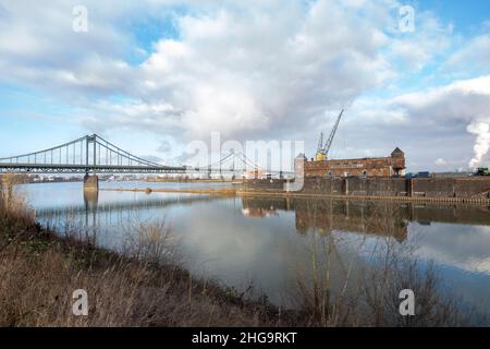 Krefeld - View to harbour in wintertime with View to River- Rhine-Bridge and reflections on the water, North Rhine Westphalia, Germany,18.01.2022 Stock Photo