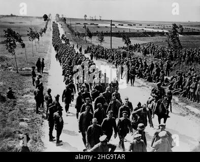 German soldiers marching on battlefield during reenactment of World War ...