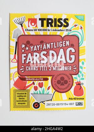 Gift for Father's Day. Father's day (In swedish: Fars dag), is celebrated on the second Sunday of November but is not a public holiday. in the picture: A lottery scratch game ticket (triss) from Svenska Spel company. Stock Photo