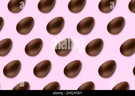 Chocolate easter eggs on pink background lined up as a pattern Stock Photo