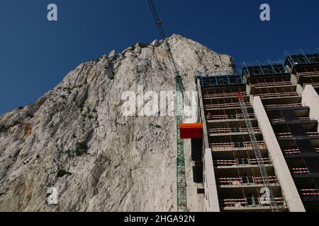 The Rock of Gibraltar and building construction works viewed from Devil's Tower Road, Gibraltar, July 2021 Stock Photo