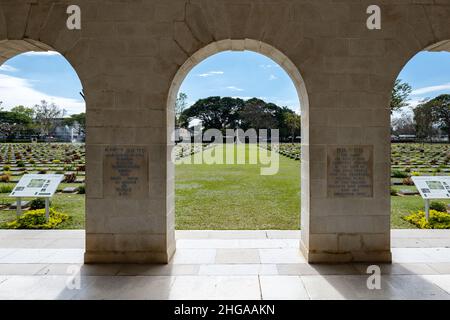 Kanchanaburi, Thailand - December 2021: The Kanchanaburi War Cemetery (known locally as the Don-Rak War Cemetery), the main prisoner of war (POW) Stock Photo