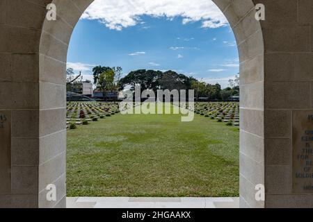 Kanchanaburi, Thailand - December 2021: The Kanchanaburi War Cemetery (known locally as the Don-Rak War Cemetery), the main prisoner of war (POW) Stock Photo