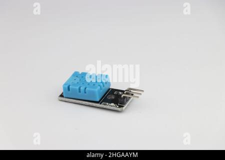 DHT11 temperature and humidity sensor module isolated on white background with side view Stock Photo