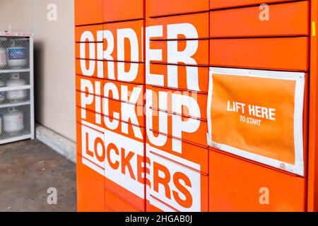 Naples, USA - August 14, 2021: The Home Depot store with orange color sign on order pickup lockers in Naples, Florida for online pick up and lift here Stock Photo