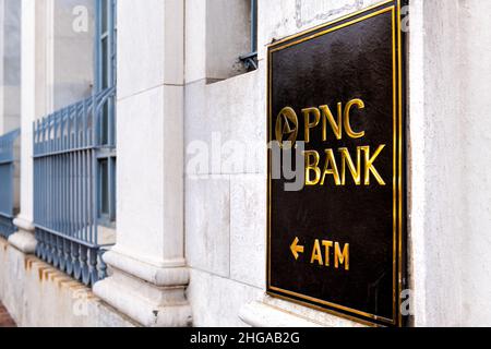 Washington DC, USA - August 18, 2021: Georgetown M street with PNC bank entrance sign logo on wall closeup directions for ATM automated teller machine Stock Photo