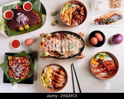 Chinese seafood full table Ebi Fry Set, Chicken Don, BBQ Squid, Katsu Don, Saba Fish Set, Salmon Don, Sliced Lamb Set and Squid Set top view Stock Photo