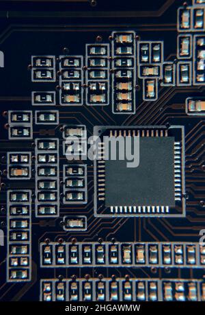 Engineer plugging CPU microprocessor to motherboard socket. Computer technology hardware maintenance or repair.  Electronics Development Working on Co Stock Photo