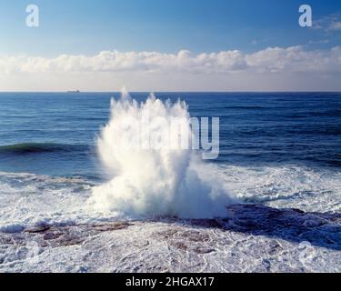 Australia. Sydney. Wave splashing on rocks. Stock Photo