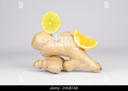 Ginger root and lemons slices. Food balance and detox concept composition. Stock Photo