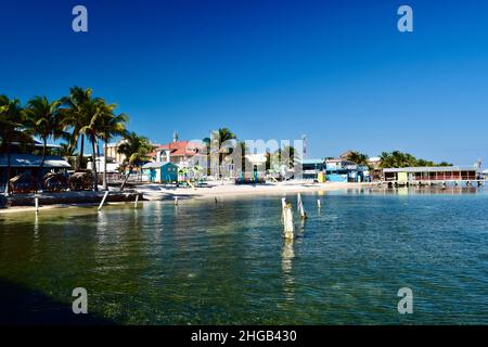 The view of San Pedro, Belize's central park/town square from a pier on a clear, blue day. Stock Photo
