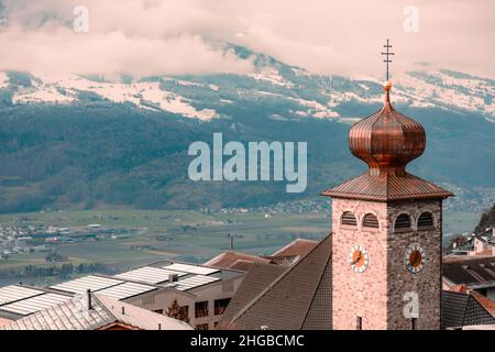 A view of village wooden cottage with tower house , Landscape background Stock Photo