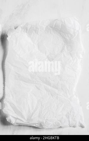 White empty crumpled baking paper background. Top view. Stock Photo