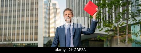 boxing day. handsome man with present box. entrepreneur hold birthday gift. Stock Photo