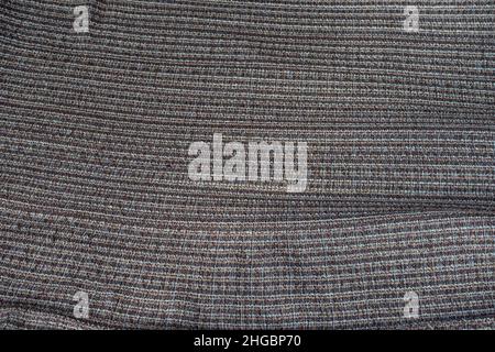 Perspective and close-up view of the abstract space of the brown fabric texture with repetitive pattern Stock Photo
