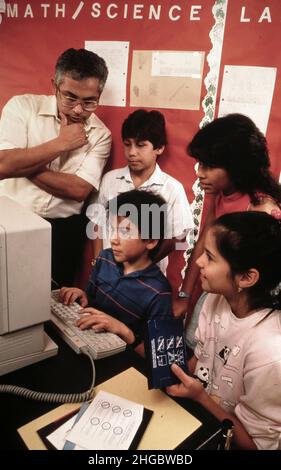 Austin, Texas USA 1990: Hispanic fifth graders in computer classroom,  MR ES-035 ©1990 Bob Daemmrich Stock Photo