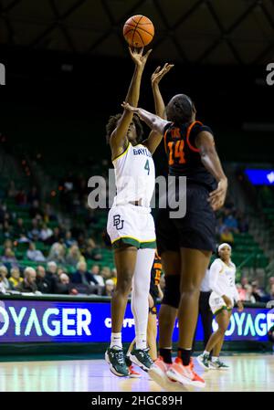 Waco, Texas, USA. 19th Jan, 2022. Baylor Lady Bears center Queen Egbo (4) shoots the ball against Oklahoma State Cowgirls forward Taylen Collins (14) during the 4th quarter of the NCAA Basketball game between the Oklahoma State Cowgirls and Baylor Lady Bears at Ferrell Center in Waco, Texas. Matthew Lynch/CSM/Alamy Live News