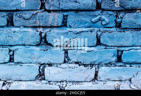 Light cyan gradient colored brick structural wall for texture and pattern background Stock Photo