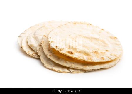 Arabic bread. Flat pita bread isolated on white background. Stock Photo