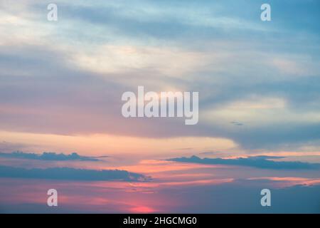 Beautiful sunset or sunrise sky in pastel soft shades of blue and pink - background Stock Photo