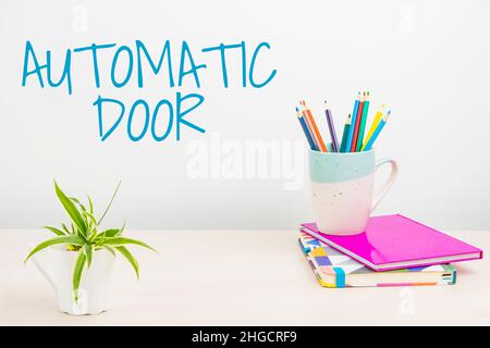 Inspiration showing sign Automatic Door. Business concept opens automatically when sensing the approach of a person Tidy Workspace Setup, Writing Desk Stock Photo