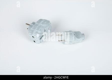 Set of universal plug adapters for travel around the world isolated on white background. Stock Photo